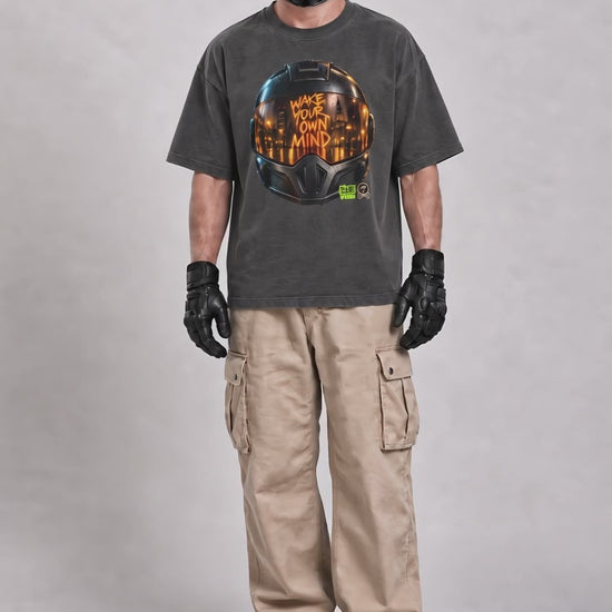 All views of the SLOW BASS® D/VISION SVO HELMET oversized T-shirt, featuring the helmet artwork and WAKE YOUR OWN MIND lettering.