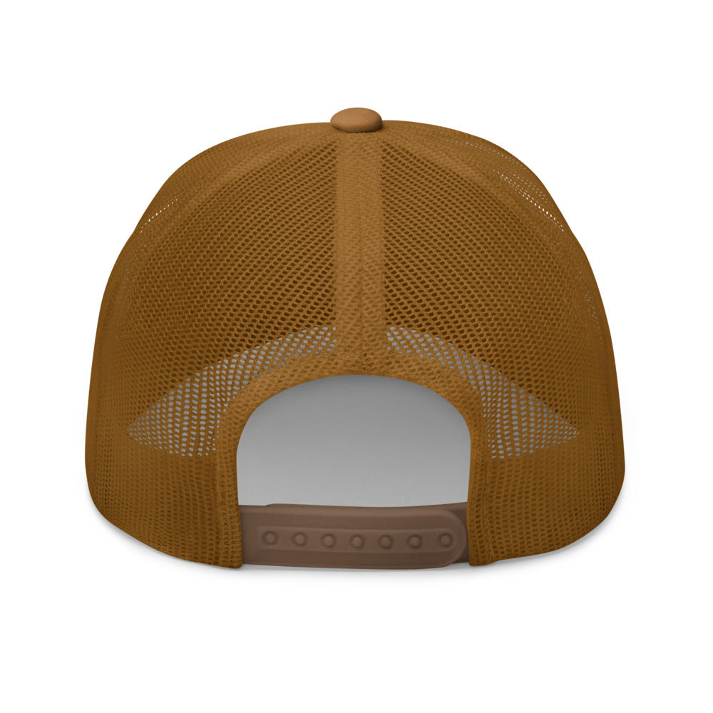 Back view of the caramel SBD #1 trucker cap, showing the mesh construction, rear opening and adjustable snap closure.