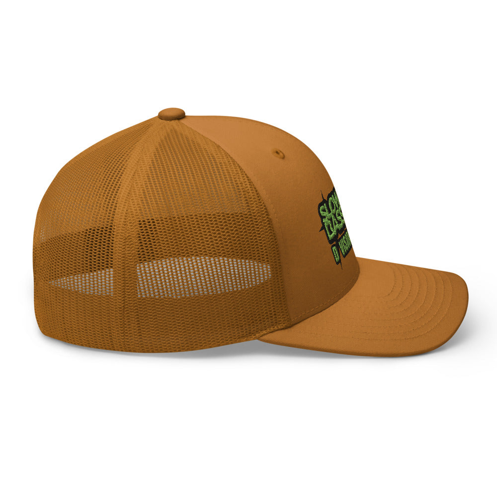Side view of the caramel SBD #1 trucker cap with the visor pointing right, showing the mesh panels and curved brim.